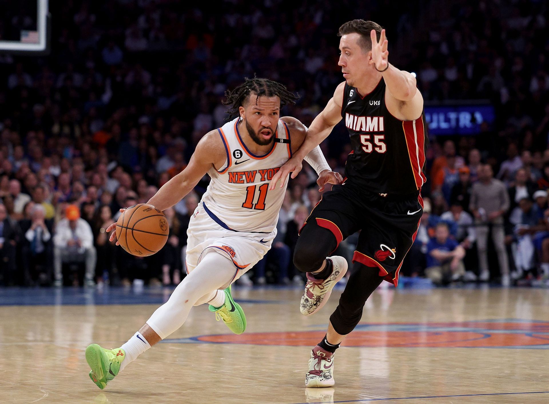 Jalen Brunson #11 of the New York Knicks heads for the net as Duncan Robinson #55 of the Miami Heat defends