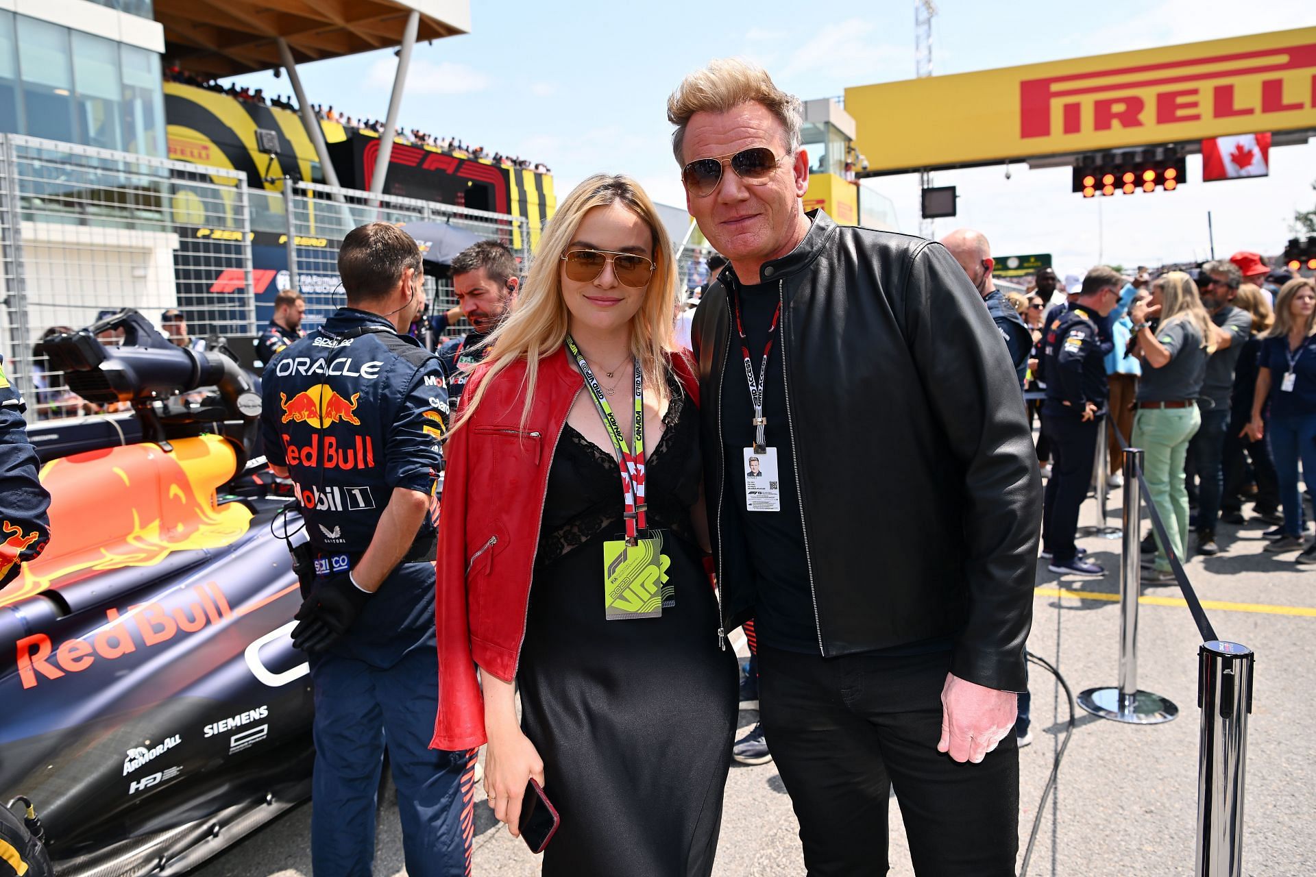 Gordon Ramsay with daughter Holly Ramsay posing with the Red Bull RB19 (Photo by Dan Mullan/Getty Images)