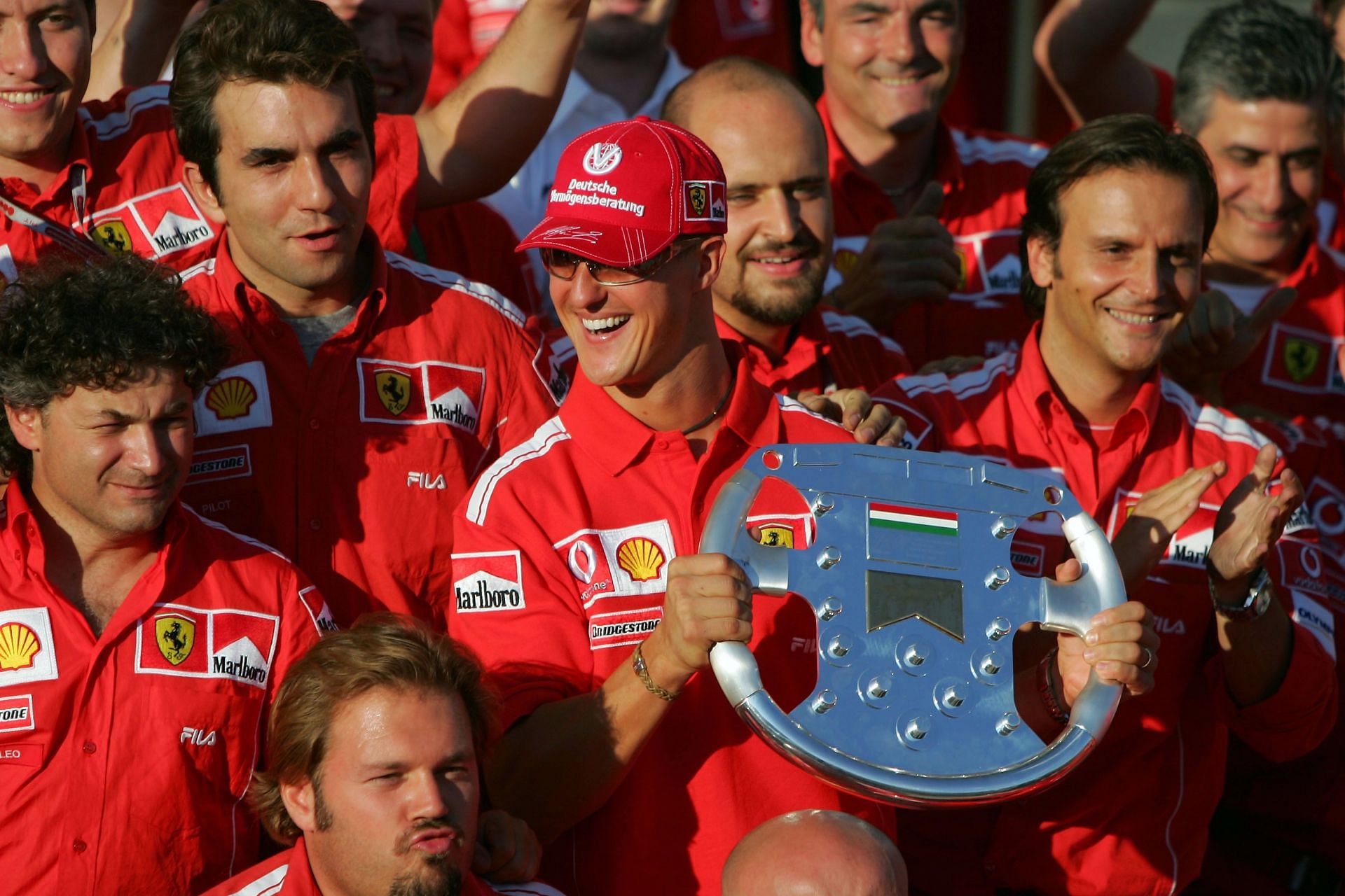 Michael Schumacher celebrates his 2004 victory at the Hungarian Grand Prix Photo by Clive Rose/Getty Images)