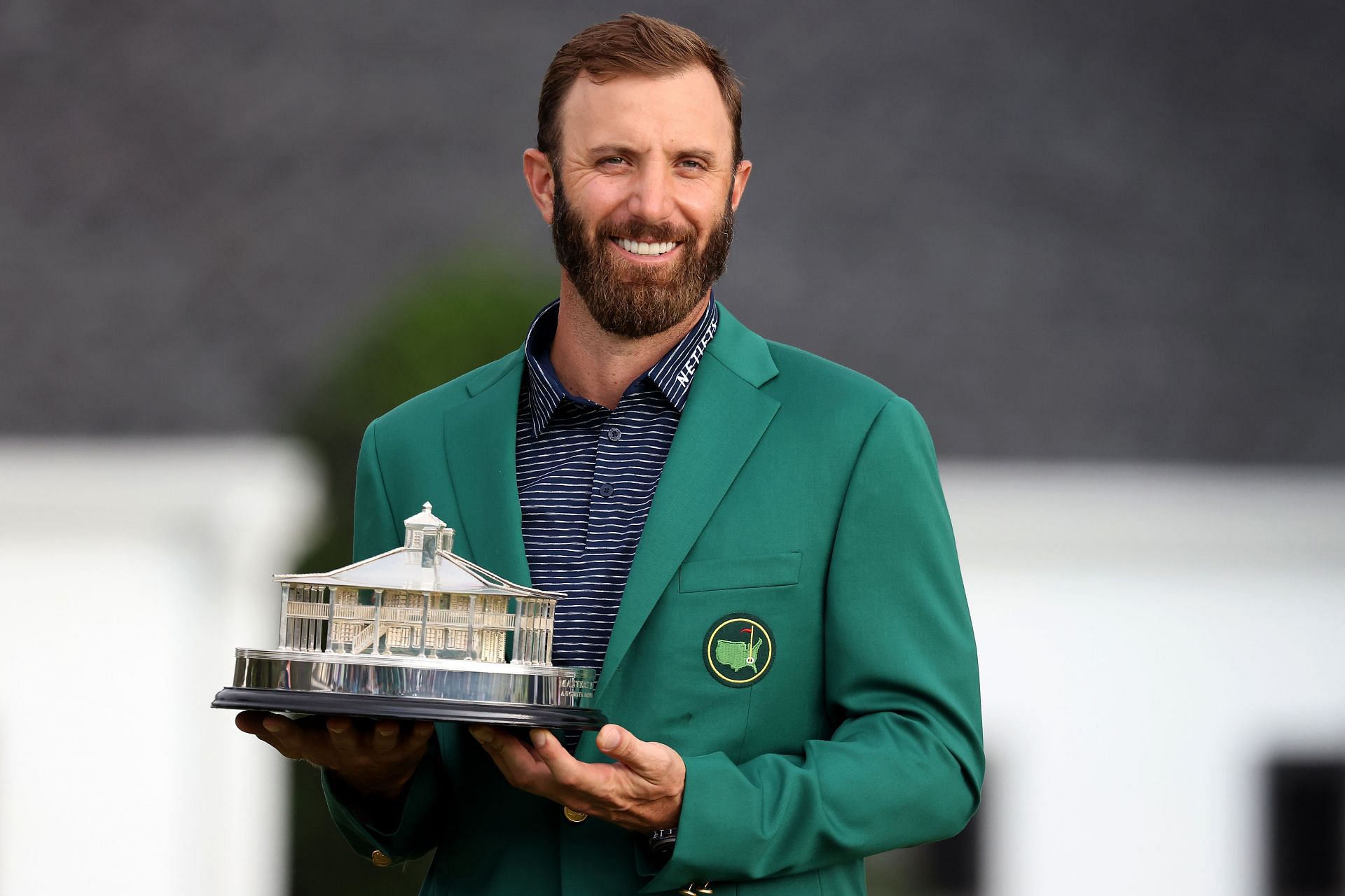 Dustin Johnson with The Master&#039;s Trophy in 2020 (via Getty Images)