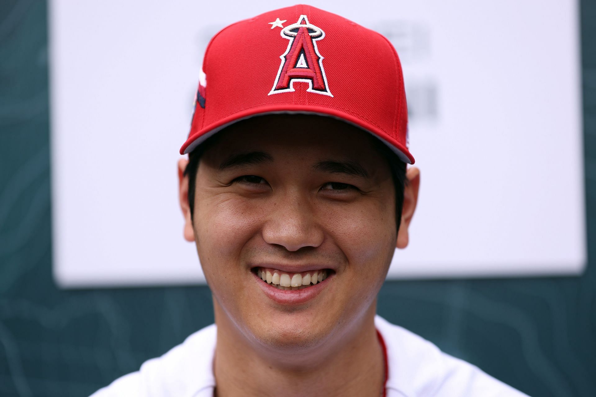Shohei Ohtani of the Los Angeles Angels speaks to the media during Gatorade All-Star Workout Day at T-Mobile Park in Seattle, Washington.
