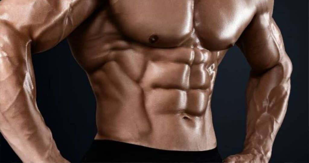 Sculpted abs and strong core (Image via Getty Images)