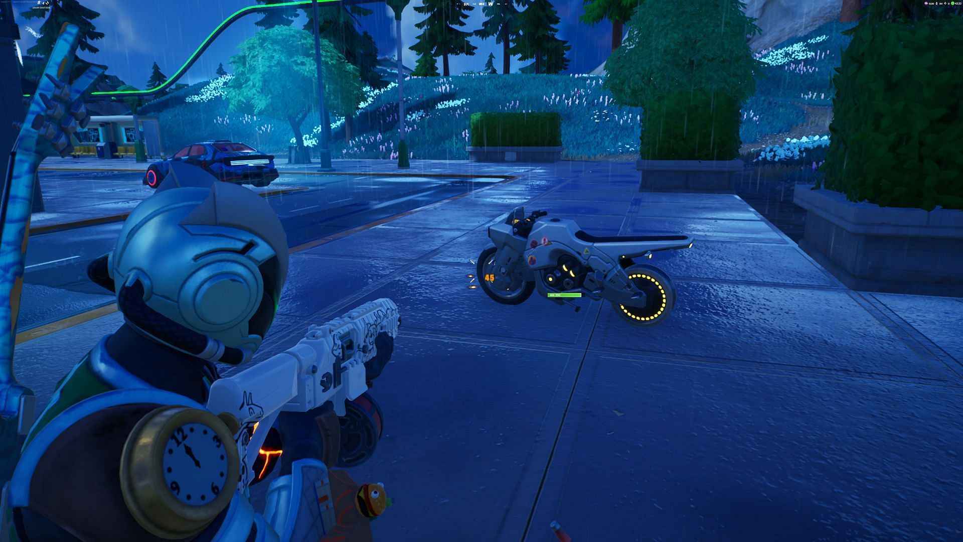 Take aim and shoot the tires to make them pop (Image via Epic Games/Fortnite)