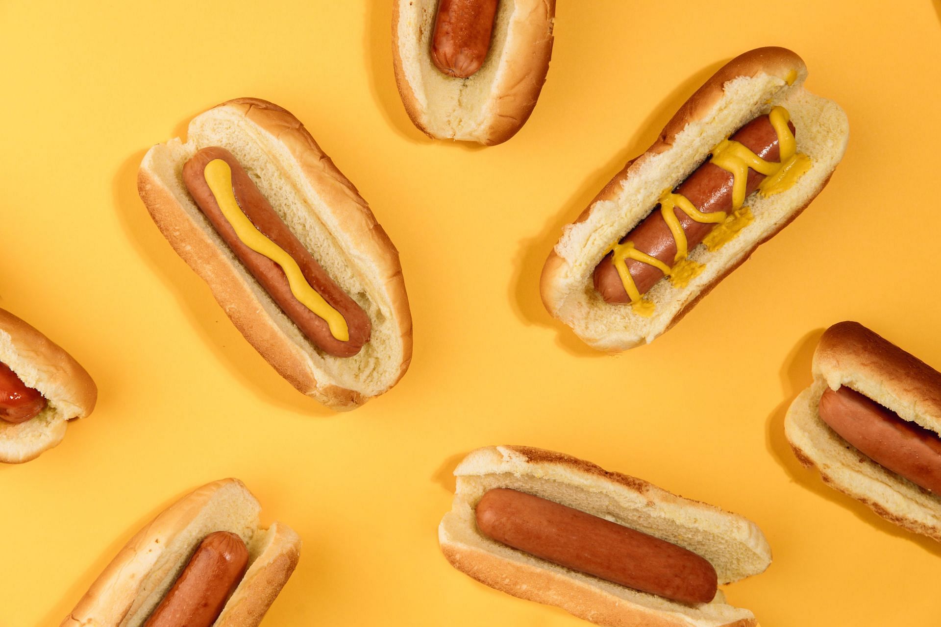 Hot dogs can be carcinogenic (Image via Unsplash / Ball Parl Brand)