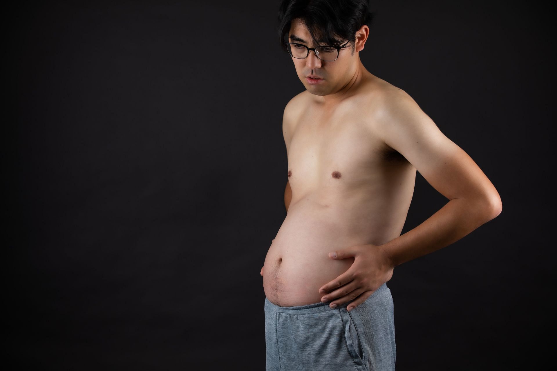 Stomach bloating is caused by undigested lactose (Image via Unsplash/sean S)