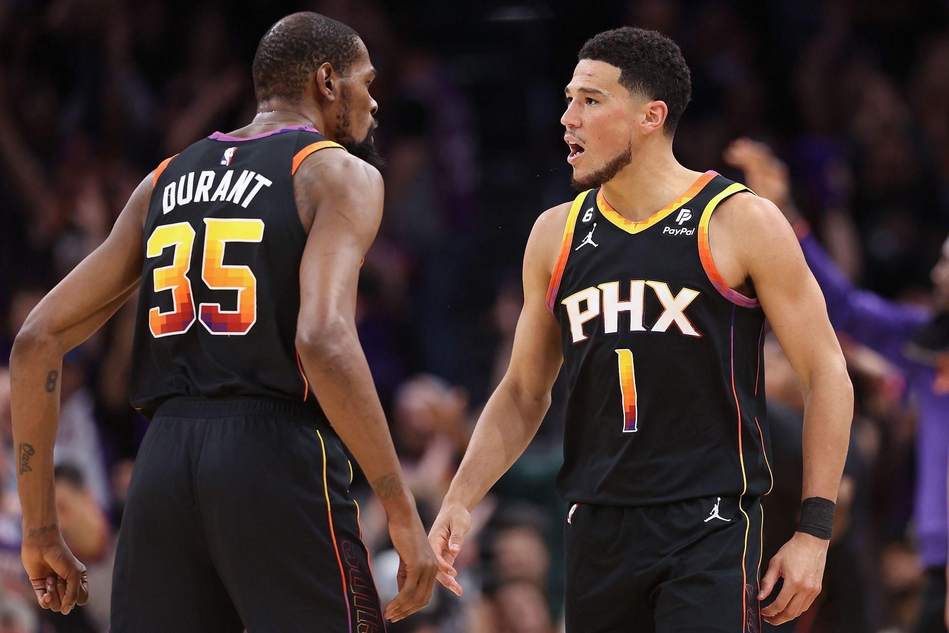 Kevin Durant and Devin Booker of the Phoenix Suns