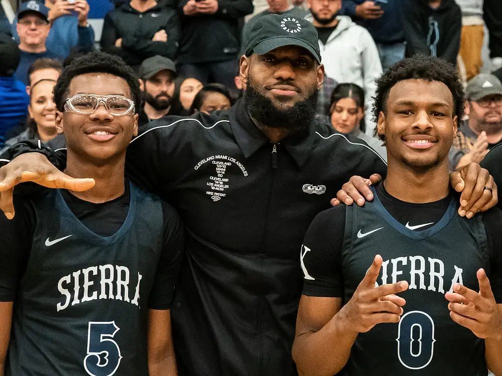 Bryce James and Bronny James with their father LeBron James