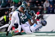 Treylon Burks #16 of the Tennessee Titans catches a touchdown over Marcus Epps #22 of the Philadelphia Eagles