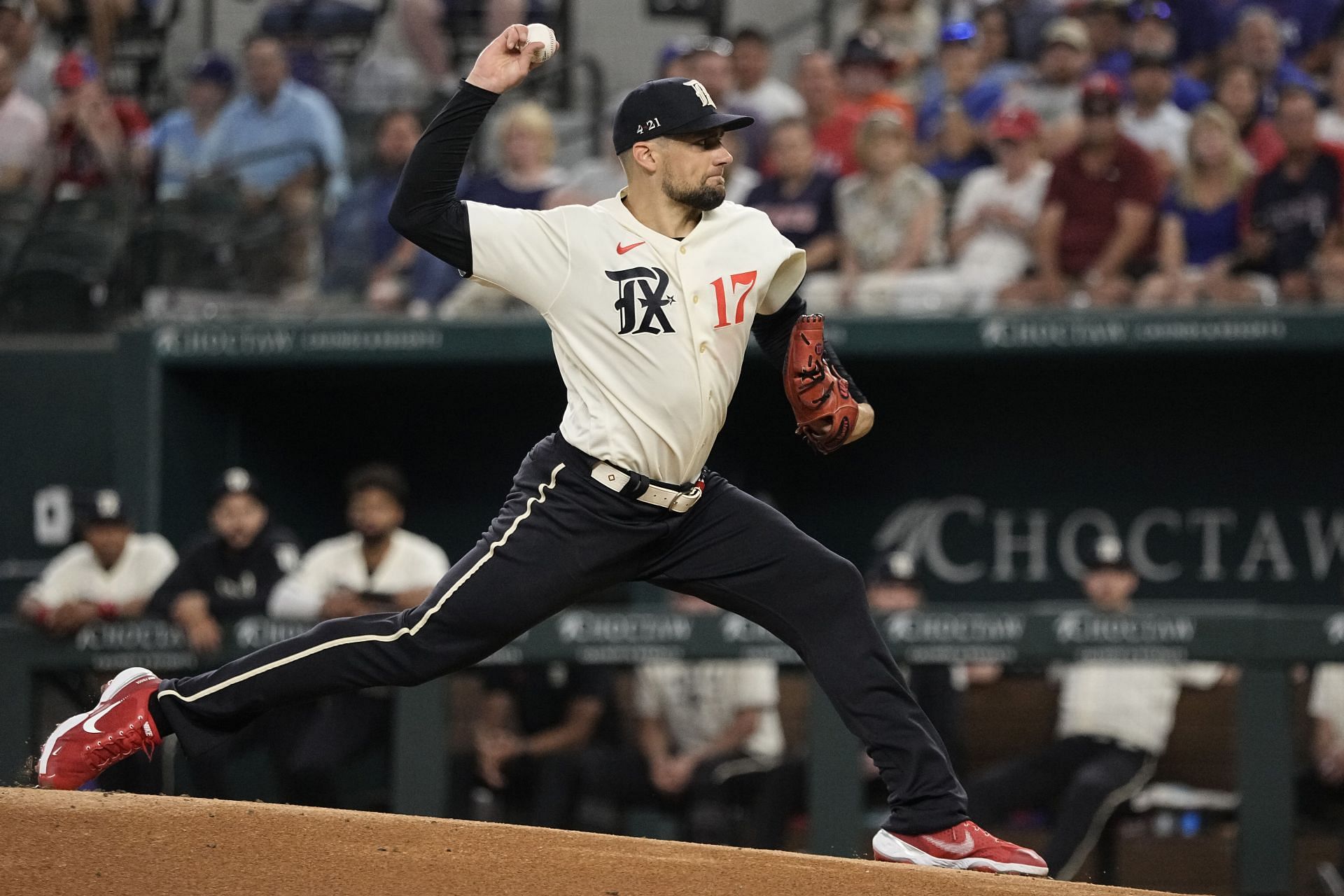 Nathan Eovaldi #17 of the Texas Rangers pitches during the game against the Houston Astros at Globe Life Field on July 01, 2023