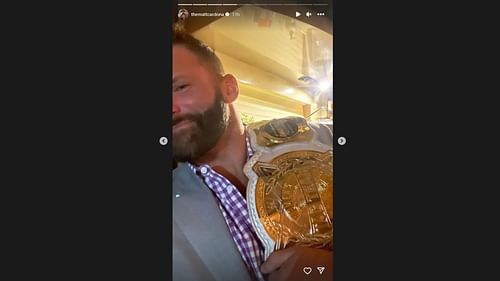Matt Cardona with the WWE Women's Championship
