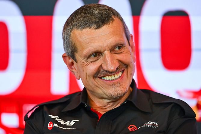 Haas team principal Guenther Steiner picks a hilarious meme for Martin Brundle stopping him during a gridwalk