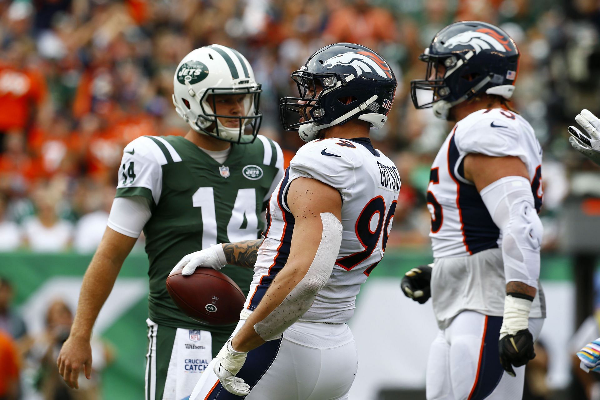 Adam Gotsis #99 of the Denver Broncos celebrates after causing Sam Darnold #14 of the New York Jets to fumble
