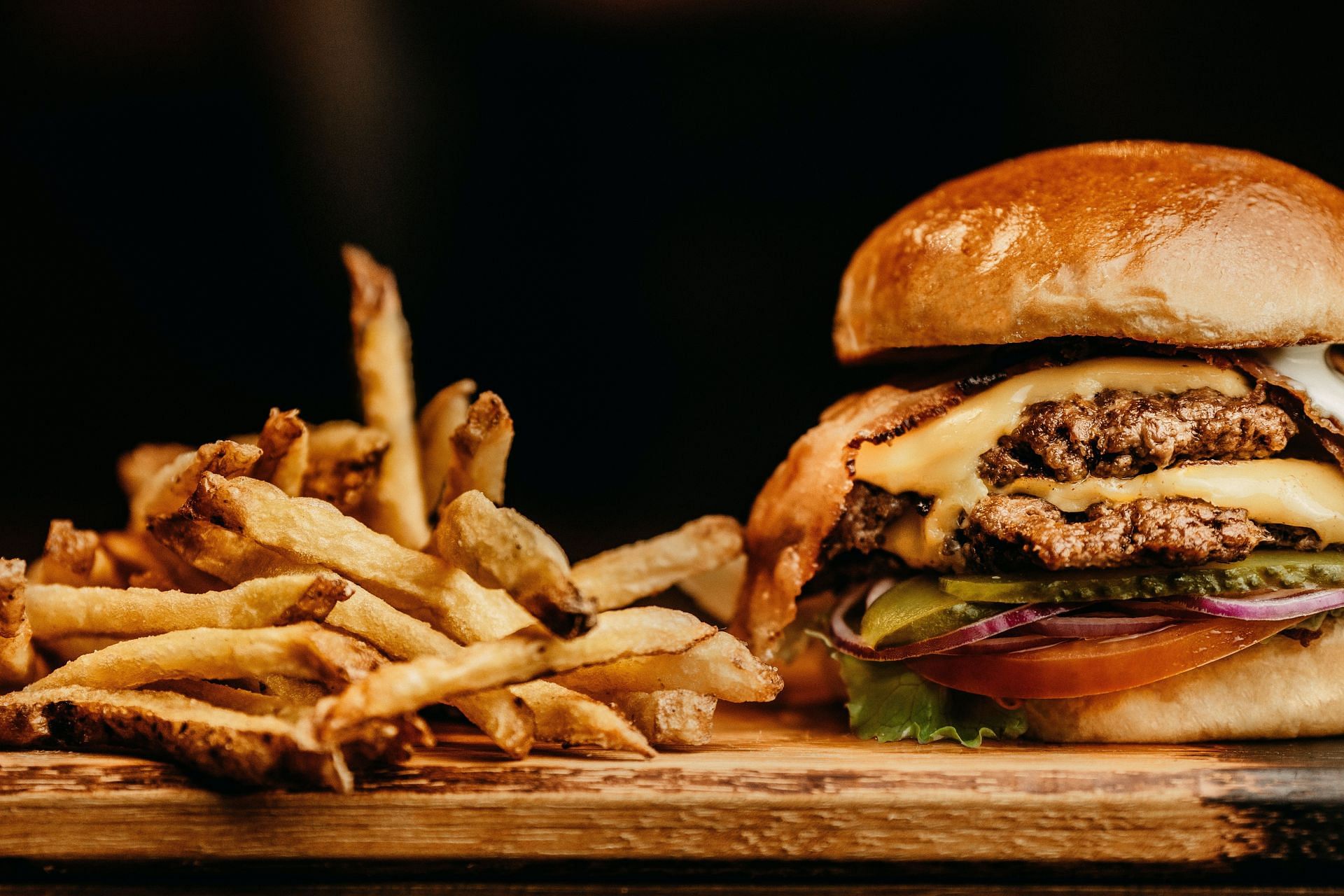 Hamburgers increas cholesterol level. (Image via Unsplash/Jonathan Borba)