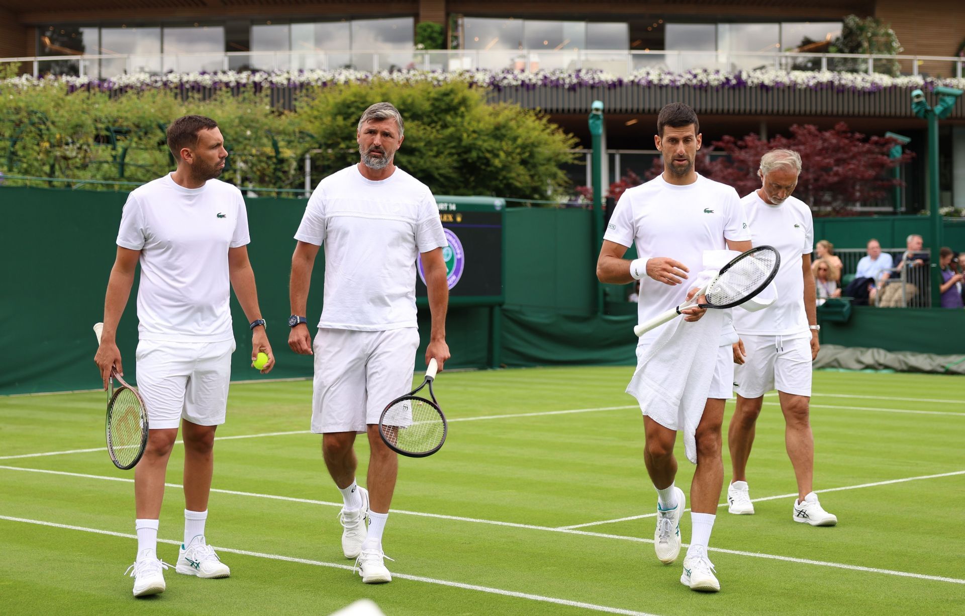 Novak Djokovic at Wimbledon 2023 practice with his team (Carlos Gomez-Herrera, Goran Ivanisevic, and Marco Panichi)