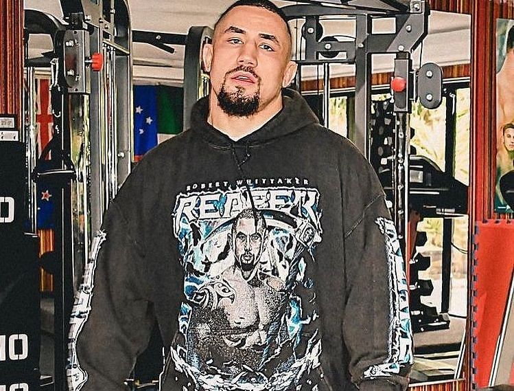How tall is Robert Whittaker?