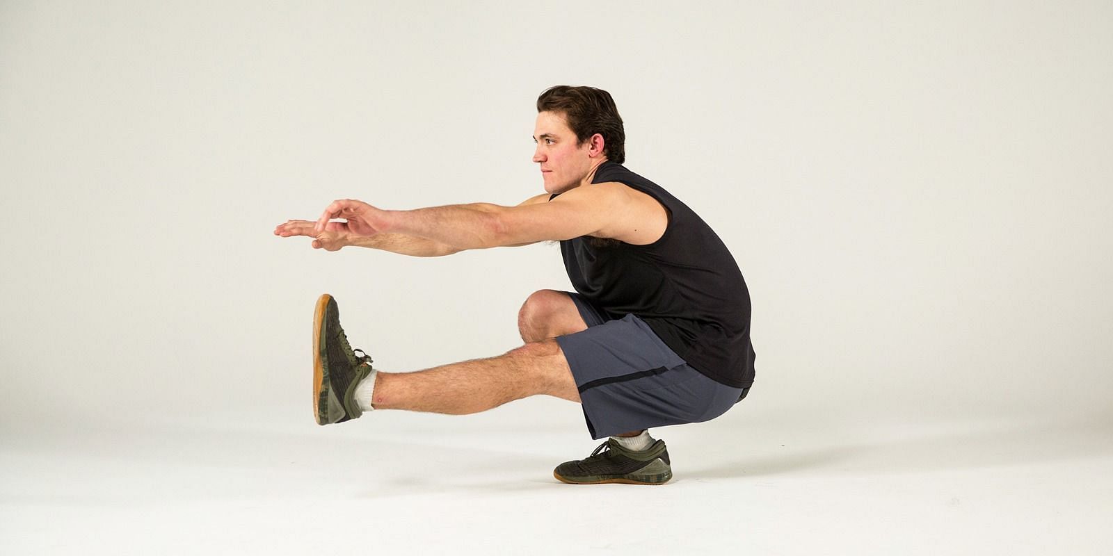 Pistol squats for Calisthenics leg workout (Image via Getty Images)