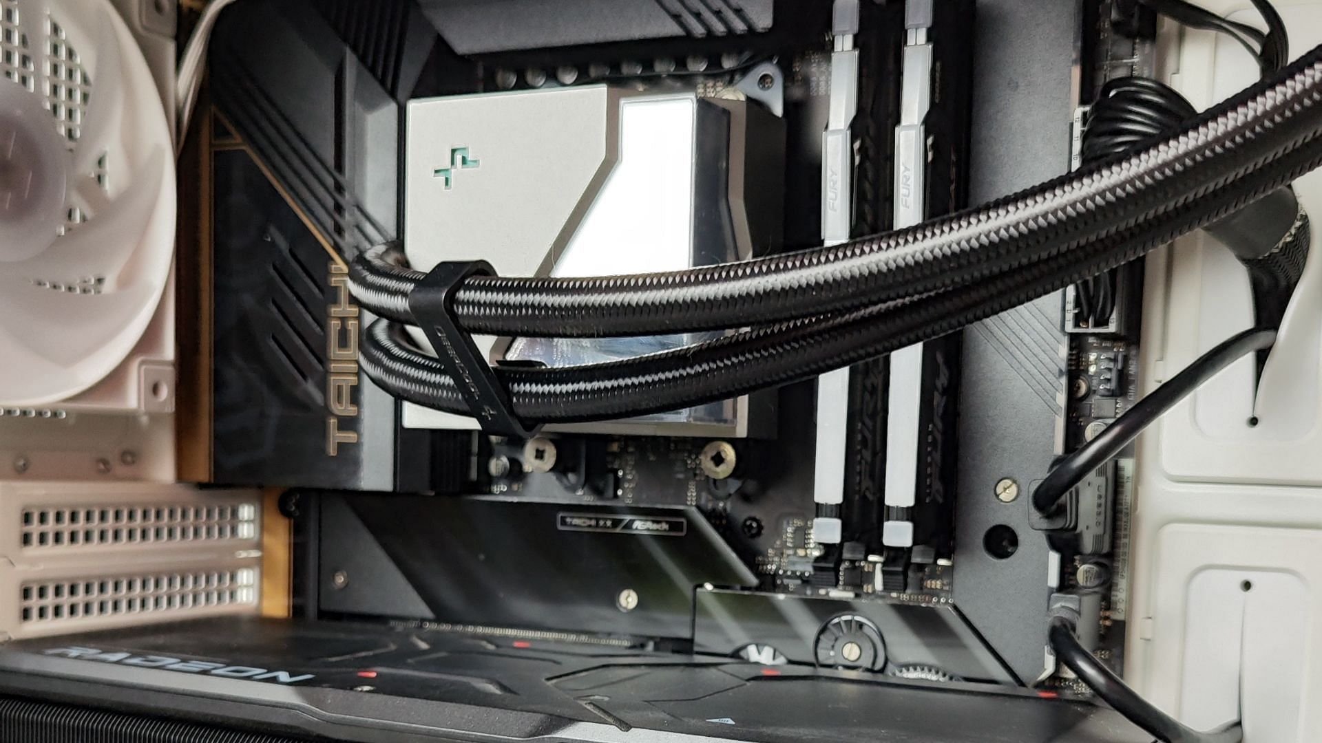 An E-ATX motherboard is installed in the case (Image via Sportskeeda)