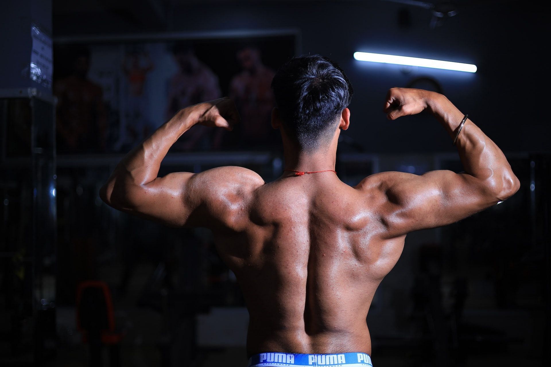 The chest supported T-bar row works on the biceps, too. (Photo via Pexels/vansh mehta)