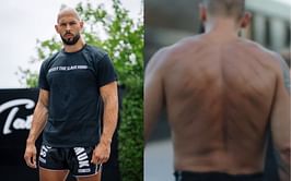 Andrew Tate reveals gruesome back scars in new training video