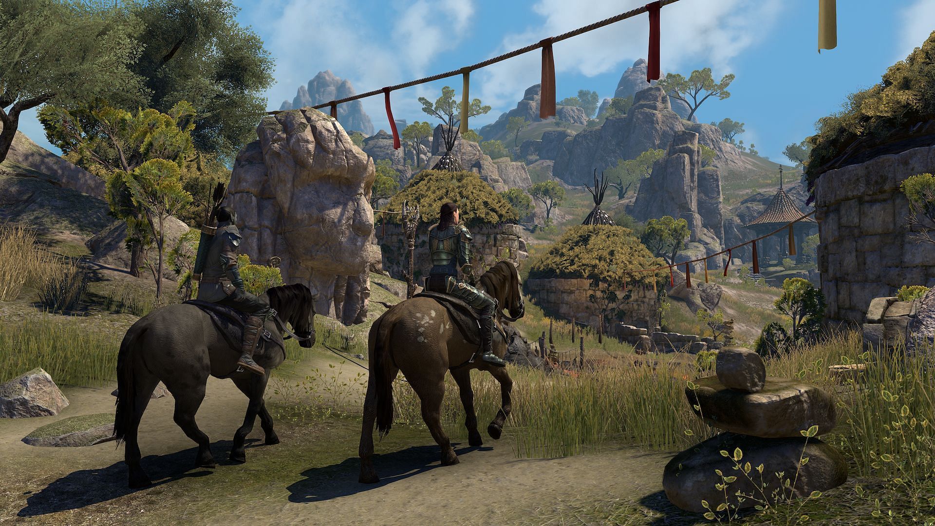 Two characters in Elder Scrolls Online riding on horses. 