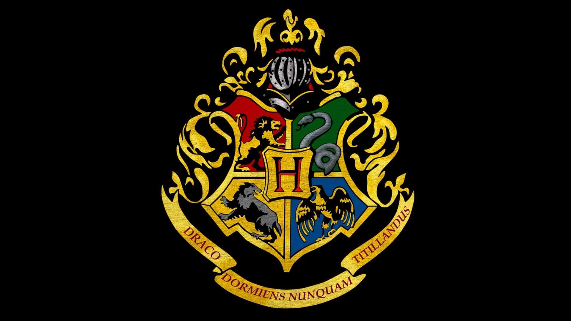 The logo of Hogwarts displaying all four houses (Image via Warner Bros. Entertainment Inc.) 