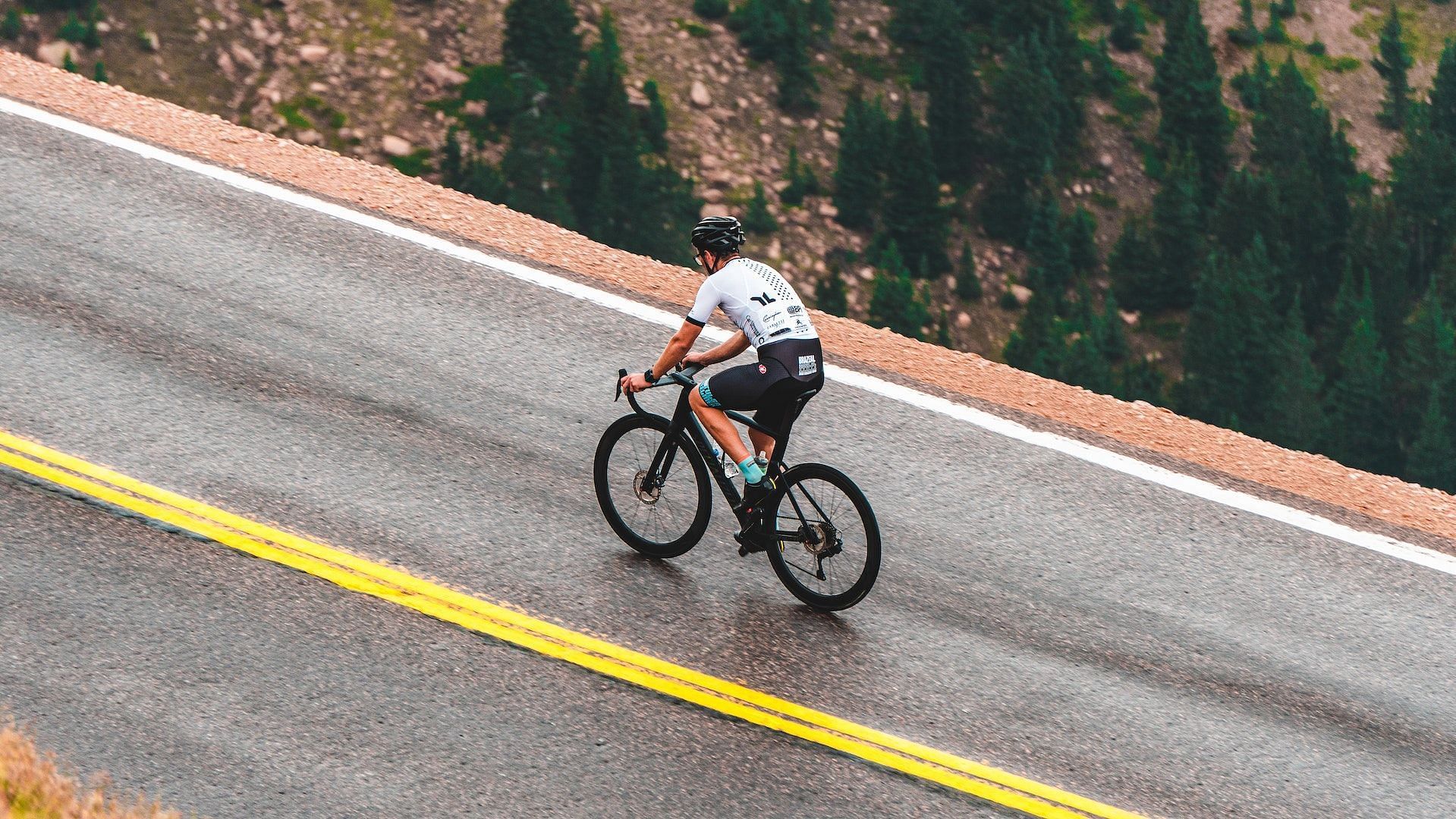 Repetitive friction during cycling can cause a tailbone injury. (Photo via Pexels/Chait Goli)