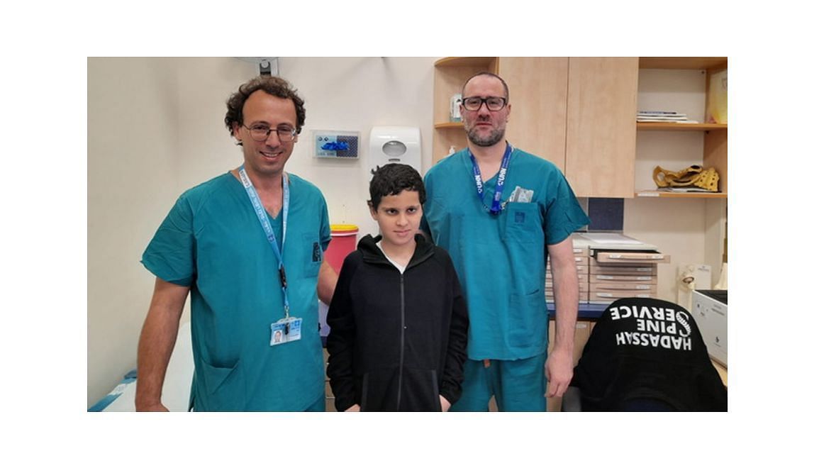 Doctors save a boy after a successfull surgery (Image via The Times of Israel/Hadassah Medical Center)