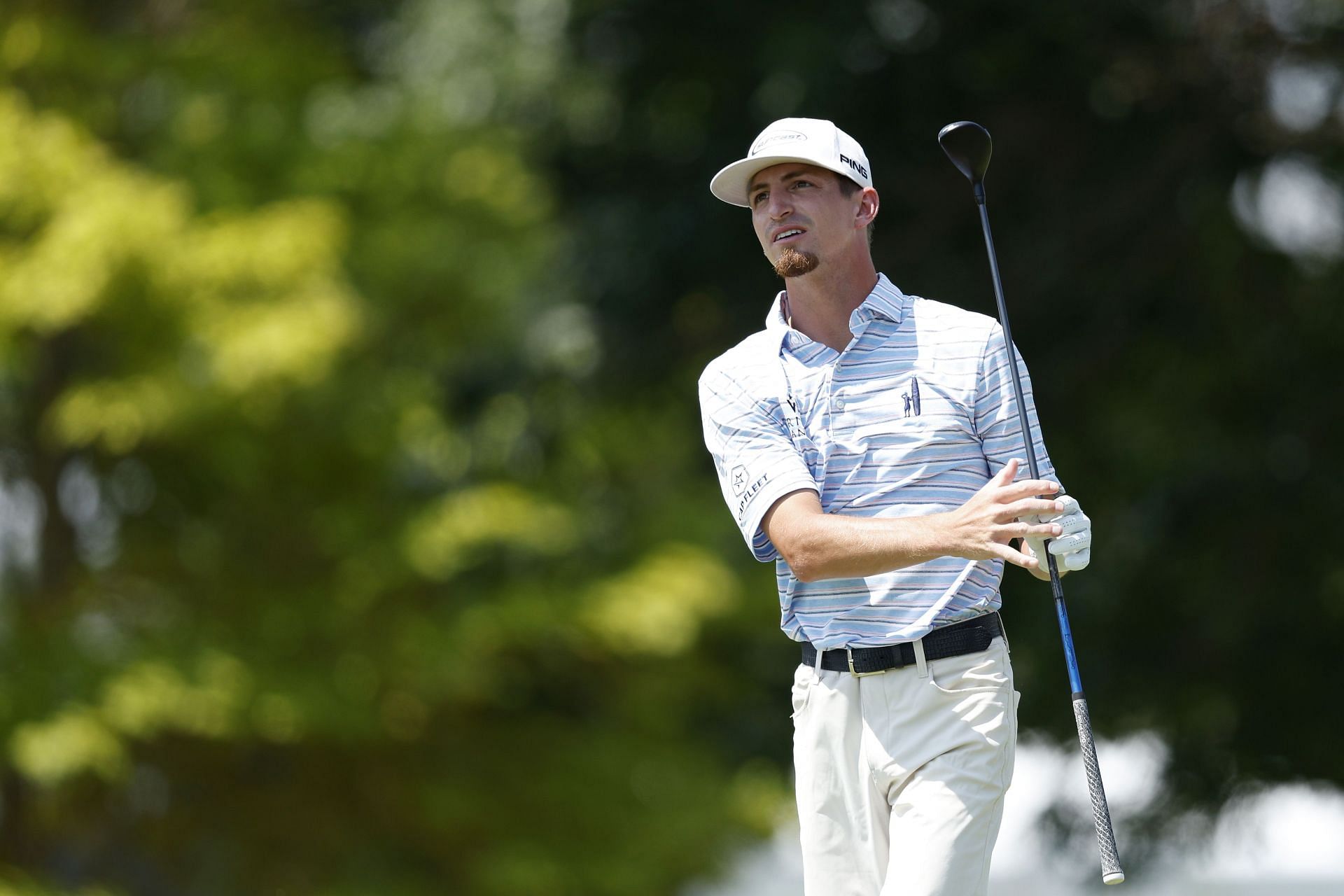 Sam Bennett watches his shot from the tenth tee during the second round of the 3M Open