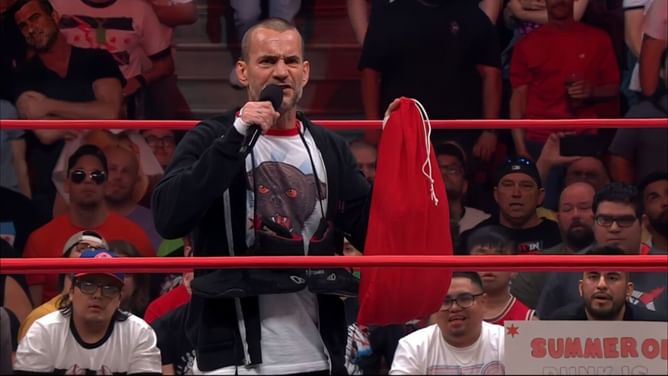 CM Punk unveils AEW World Championship from his red bag on Collision; first challenger revealed