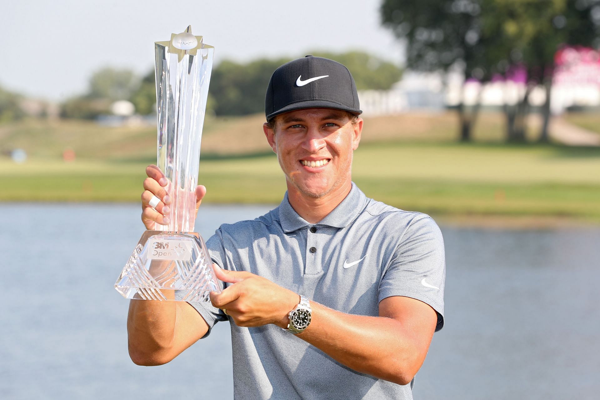 Cameron Champ with the 3M Open trophy in 2021 (via Getty Images)