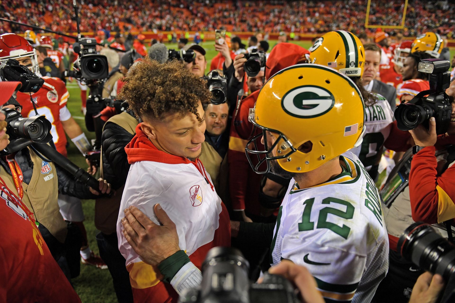 Aaron Rodgers (R) greeting Patrick Mahomes (L)