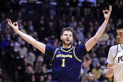 Hunter Dickinson of the Michigan Wolverines reacts after a play