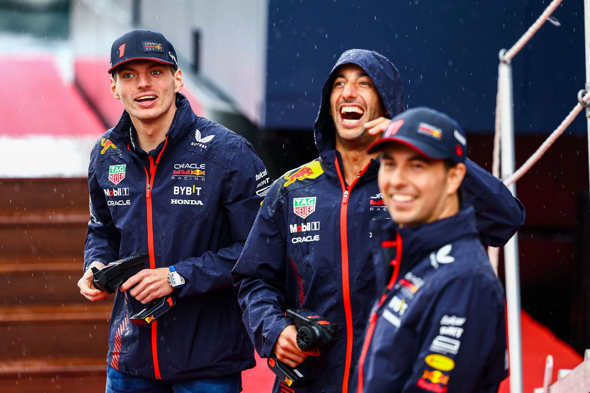 Max Verstappen, Daniel Ricciardo and Sergio Perez taking part in an RC Boat contest on the Red Bull Racing Energy Station during previews ahead of the F1 Grand Prix of Monaco Monaco Grand Prix