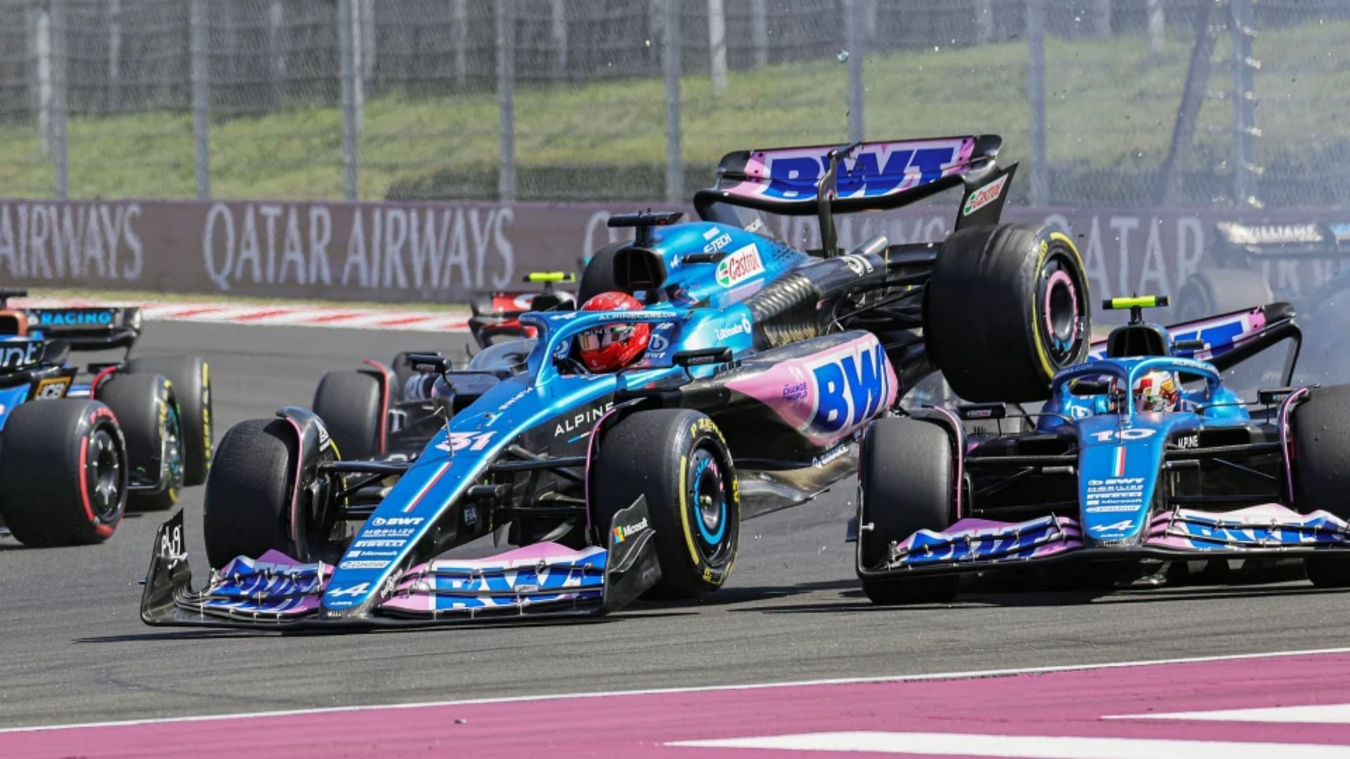 Esteban Ocon (31) and Pierre Gasly (10) crash into each other at the start of the 2023 F1 Hungarian Grand Prix (Image via The Sun content pool)