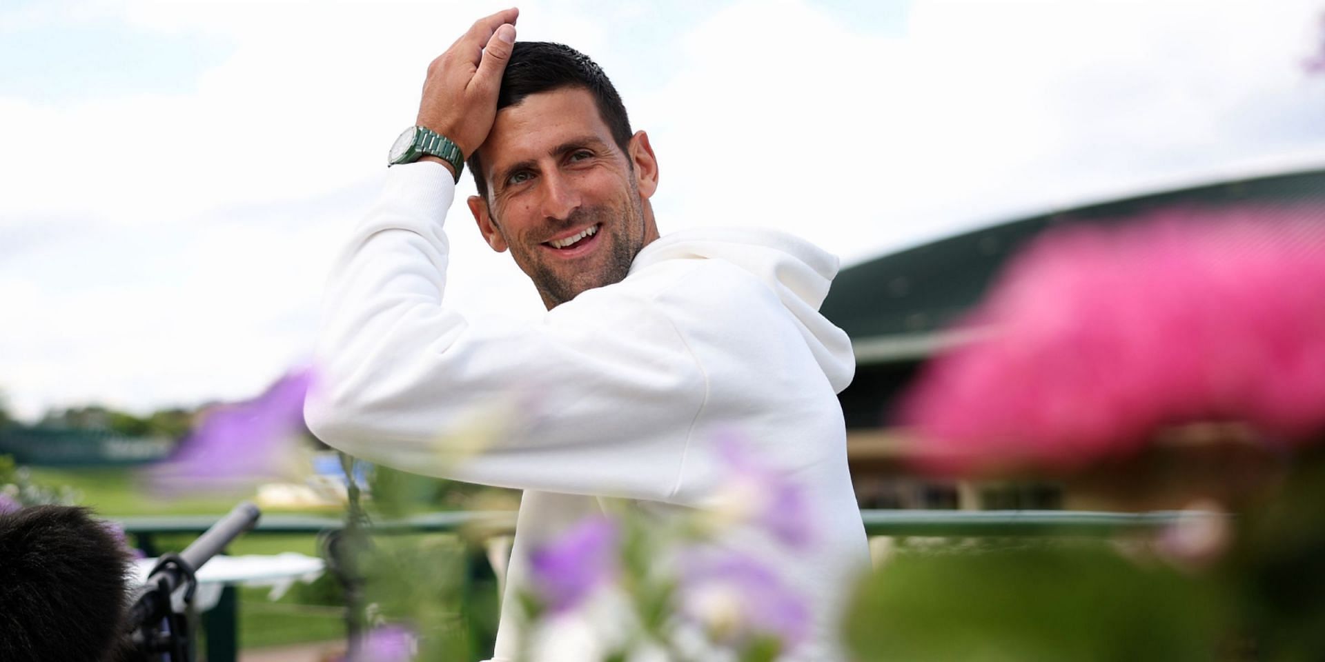 Novak Djokovic joked about needing compensation for his help in drying the court at Wimbledon 