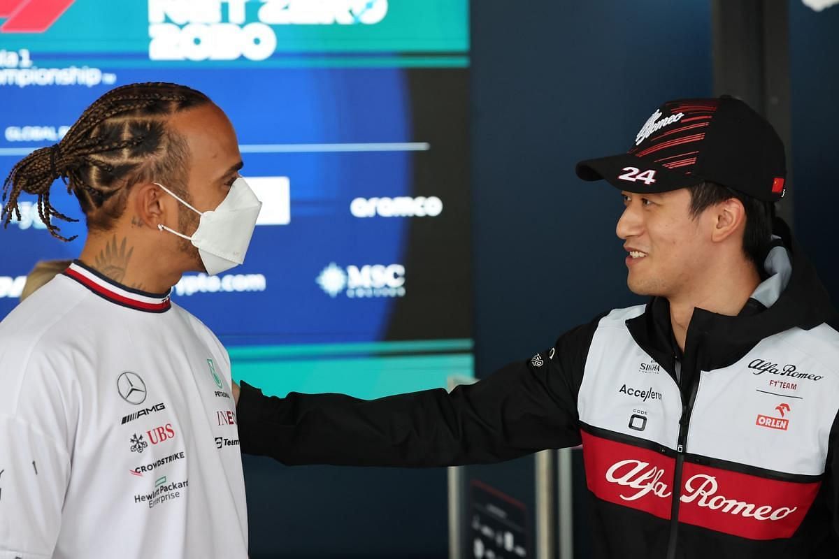 Zhou Guanyu with Lewis Hamilton