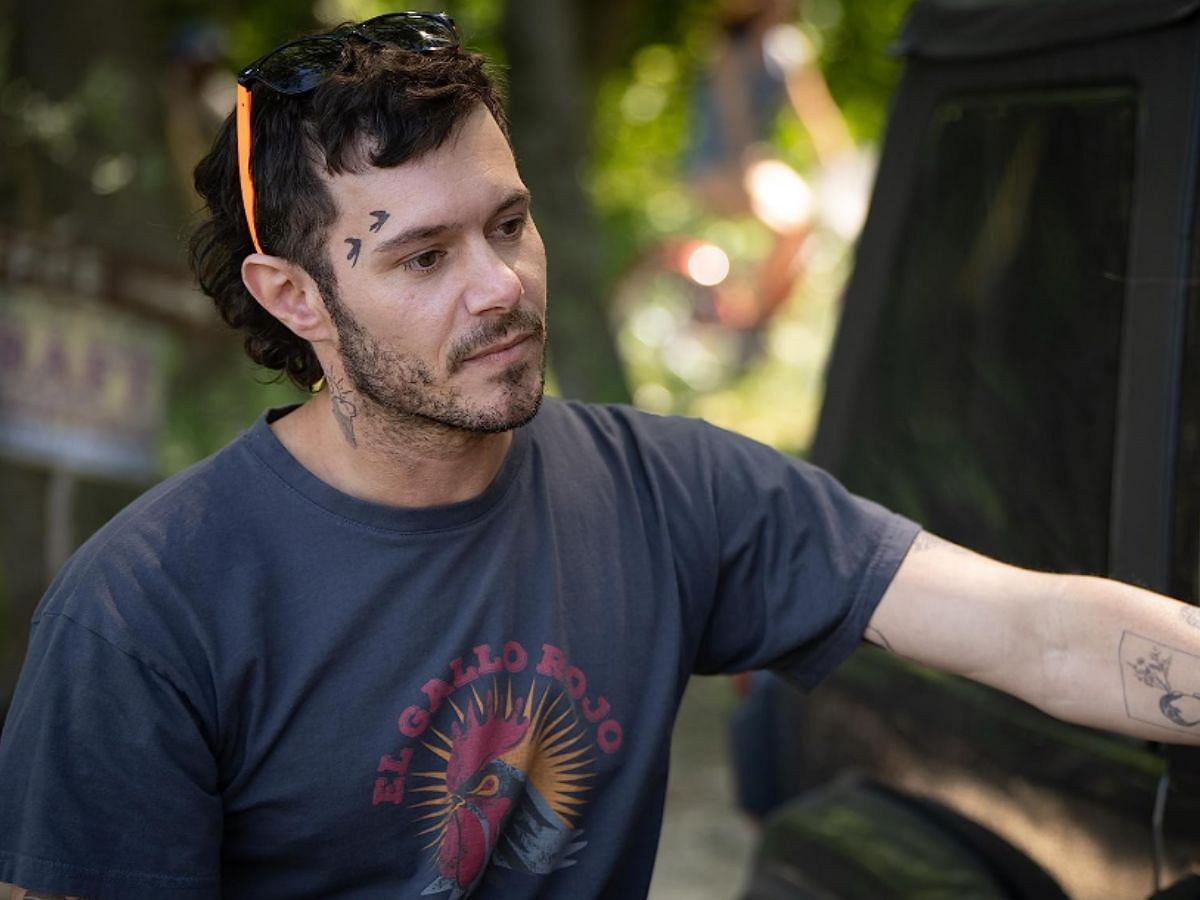 A still of Adam Brody as Trevor in Wild River (Image Via IMDb)