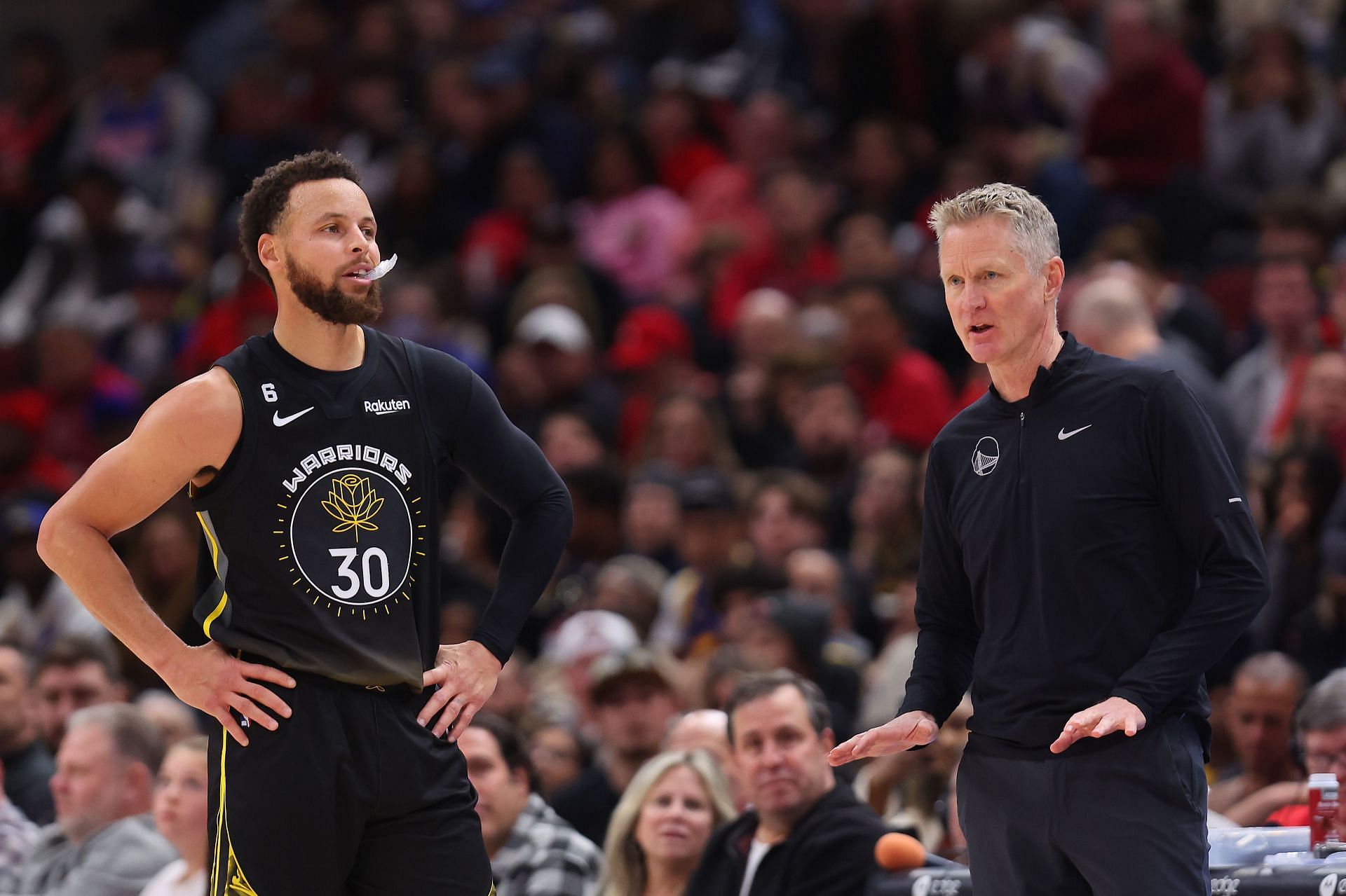 Steph Curry (left) and Steve Kerr of the Golden State Warriors