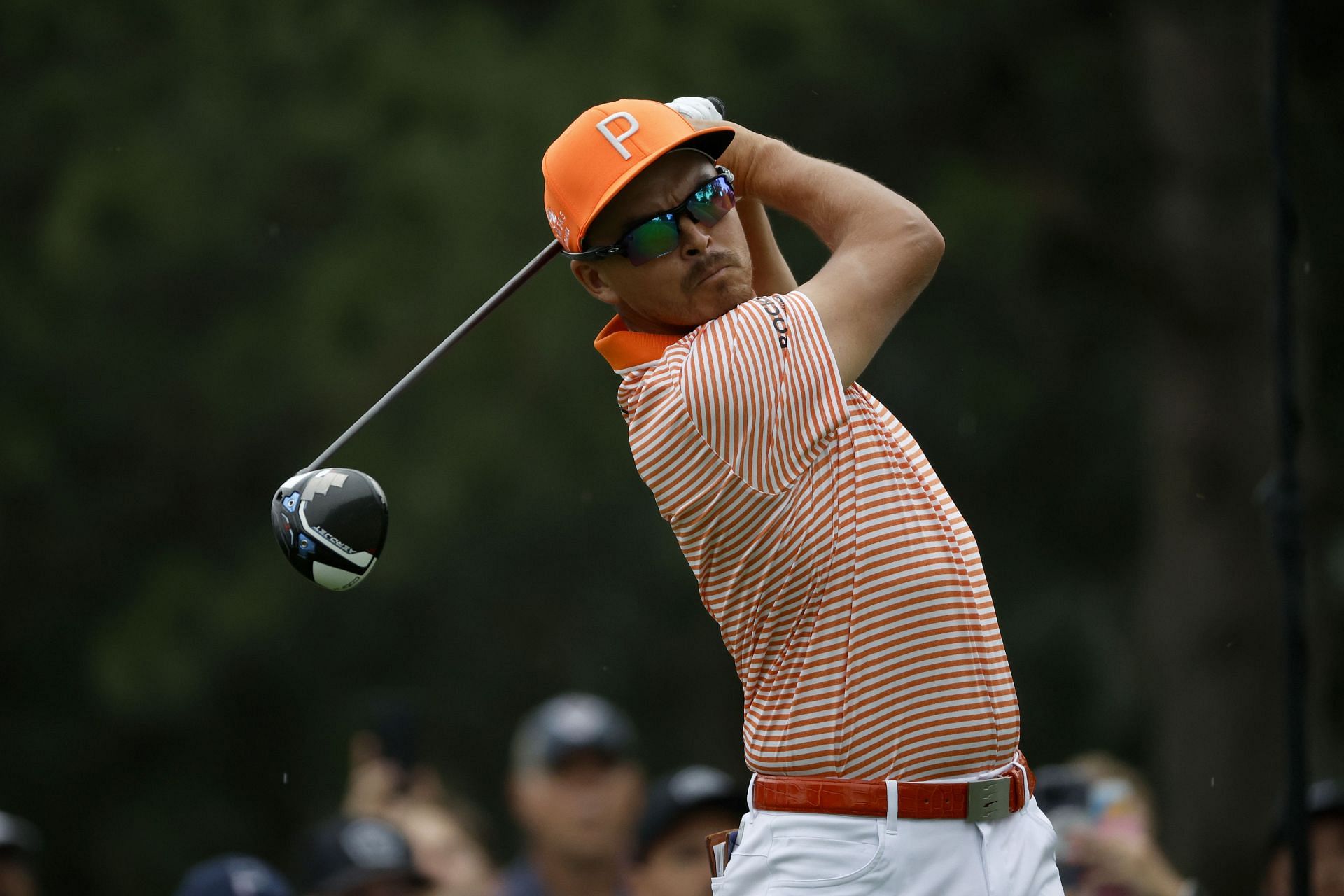 How many positions did Rickie Fowler jump in the Official World Golf