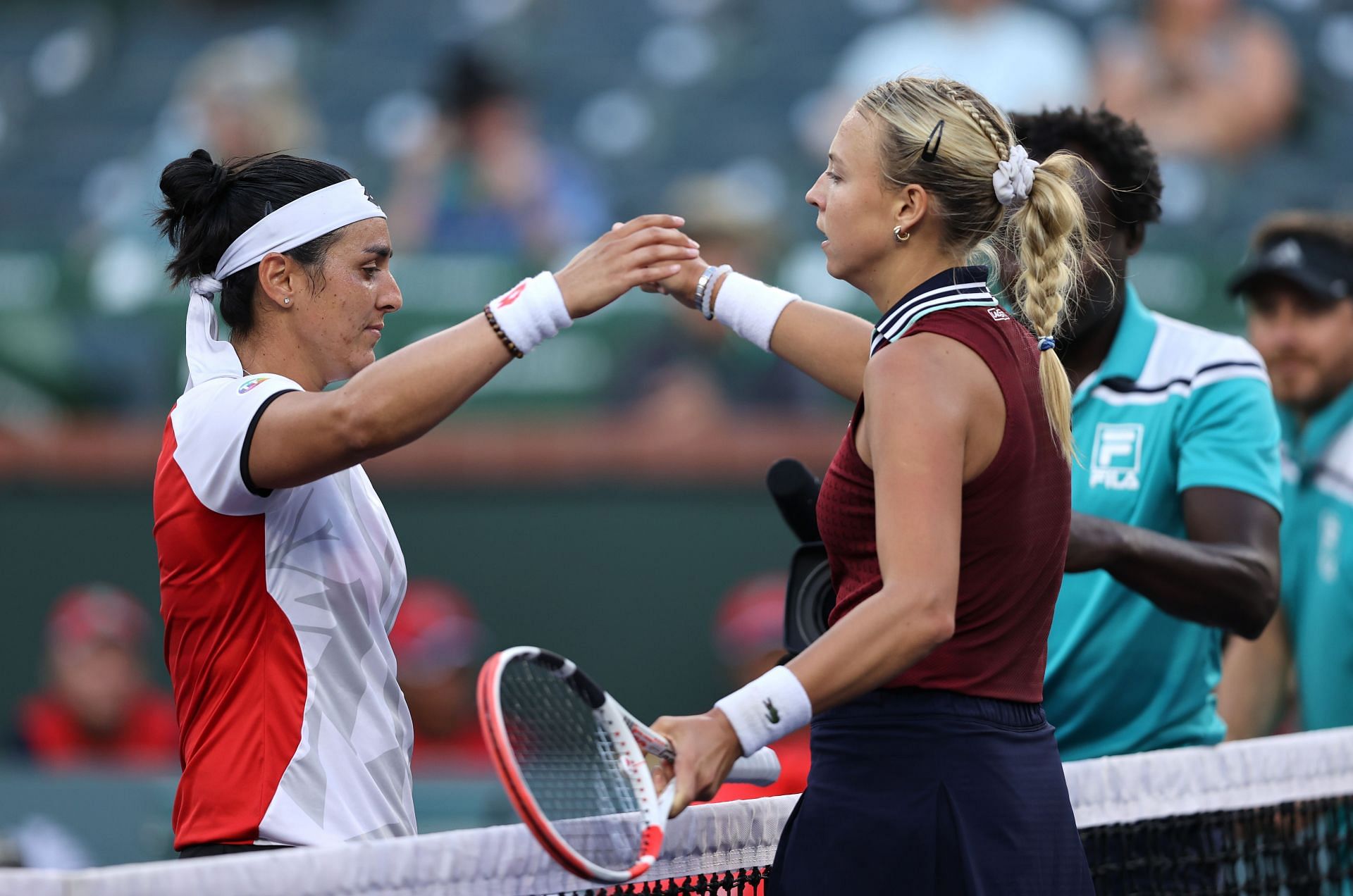 Ons Jabeur (L) and Anett Kontaveit at 2020 BNP Paribas Open.