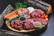Meat is among the low-oxalate foods (Image via Unsplash/Eiliv Aceron)