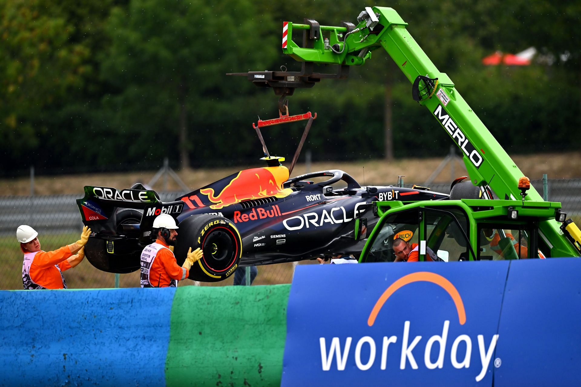 Sergio Perez&#039;s RB19 being cleared off the track after crashing, FP1, 2023 Hungarian GP (Photo by Dan Mullan/Getty Images)