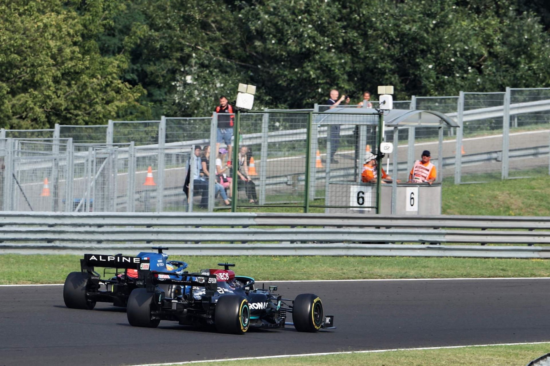 The Mercedes and Alpine on the Tarmac 