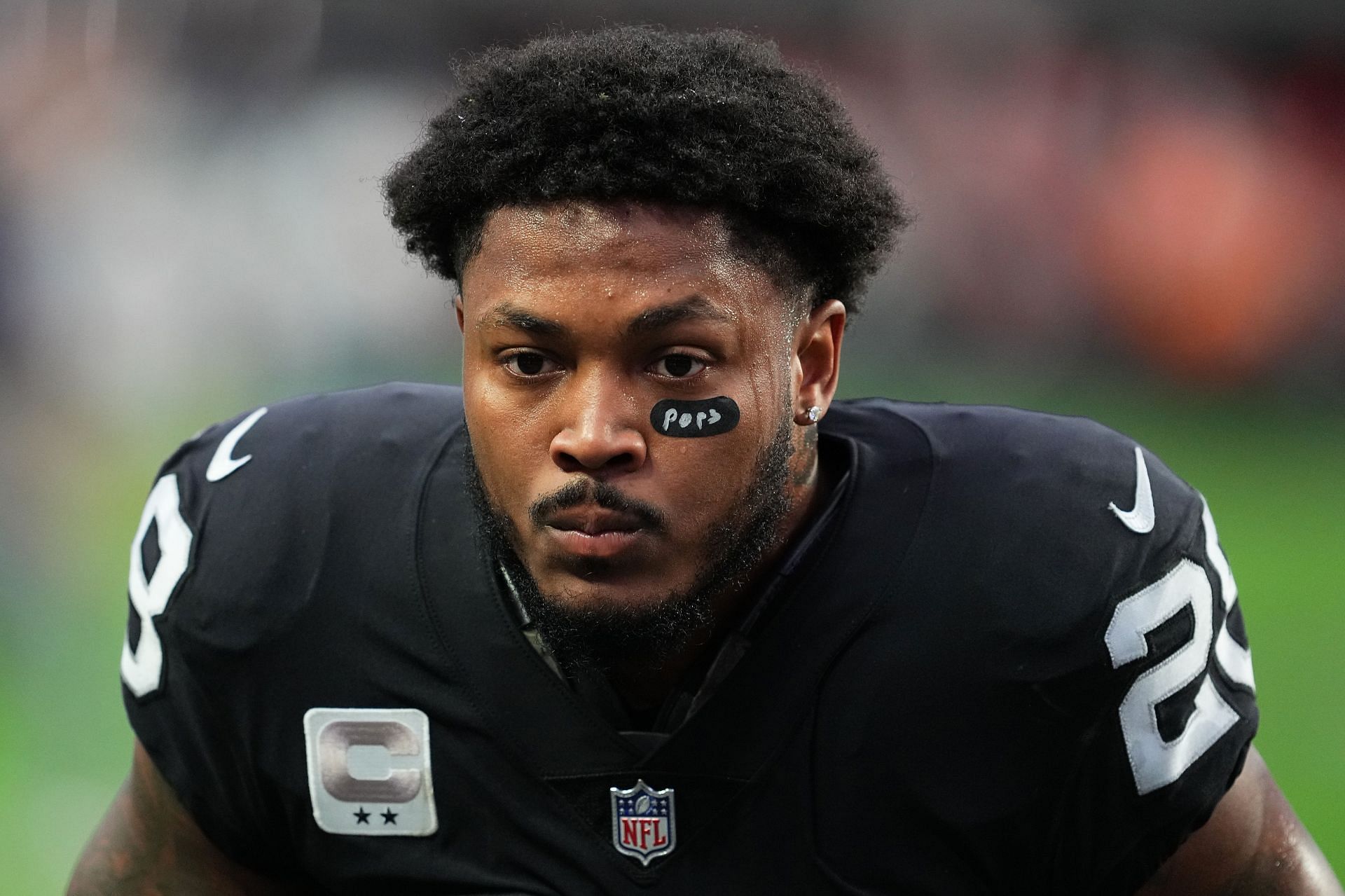 Josh Jacobs, #28 of the Las Vegas Raiders, warms up before a game against the Kansas City Chiefs at Allegiant Stadium on January 07, 2023, in Las Vegas, Nevada.