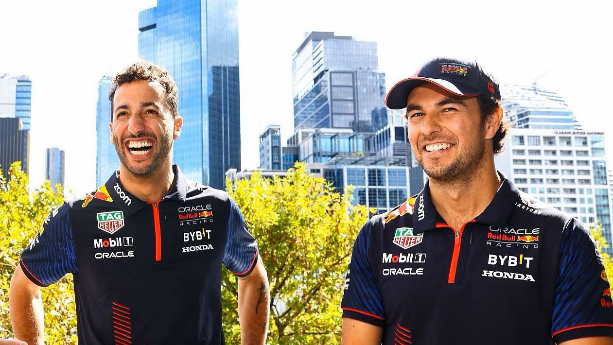 Daniel Ricciardo and Sergio Perez during previews ahead of the 2023 F1 Australian Grand Prix. (Photo by Mark Thompson/Getty Images)