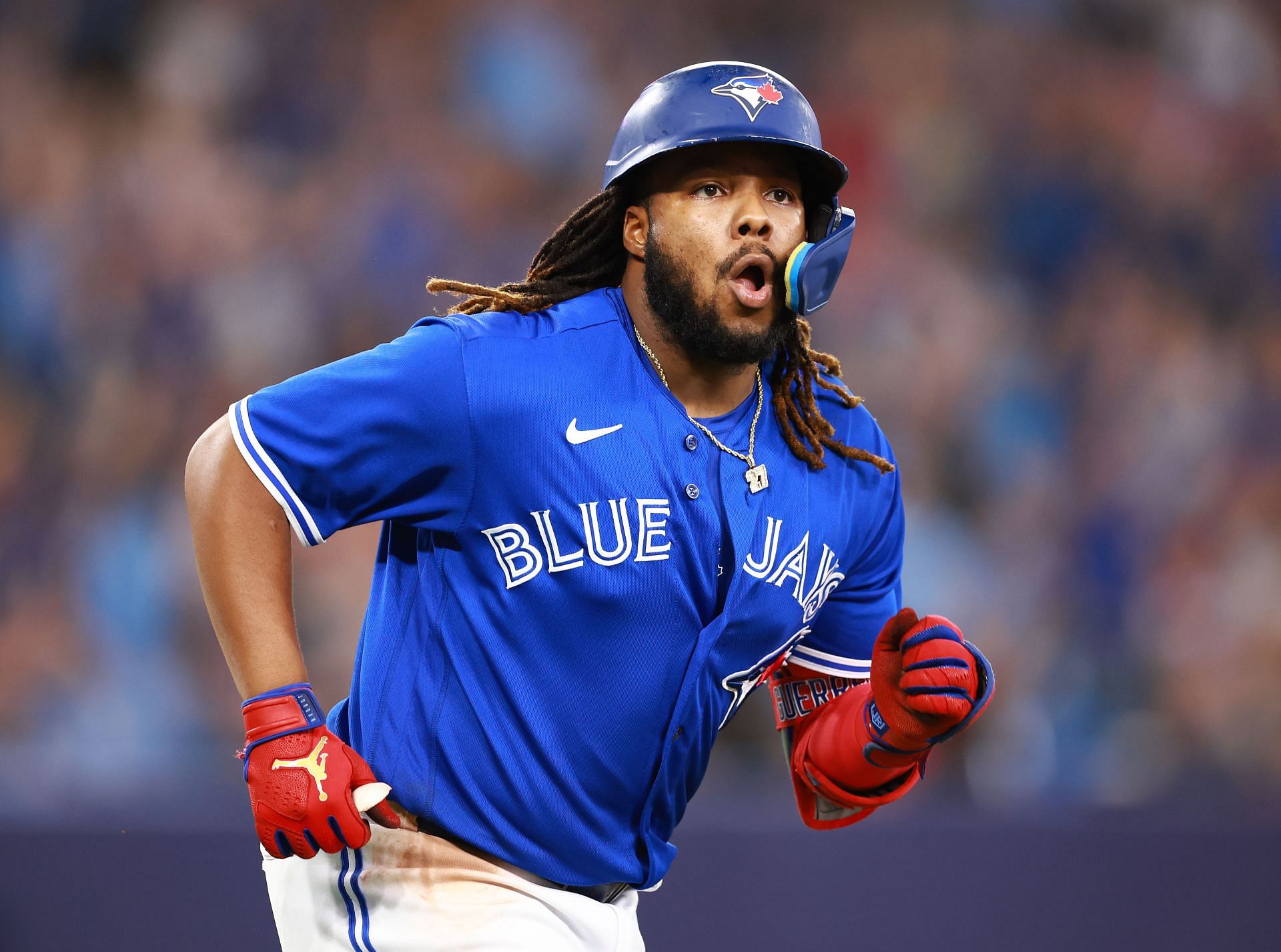 Vladimir Guerrero Jr. of the Toronto Blue Jays reacts after hitting a two-run home run.