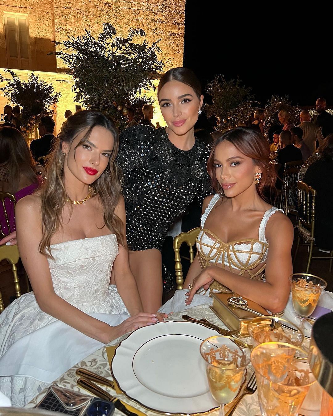 Olivia Culpo (center) with Alessandra Ambrosio (left) and musician Anitta (right). (Image credit: Olivia Culpo on Instagram)