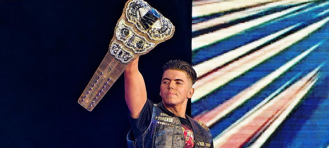 Sammy Guevara Holding AEW title belt