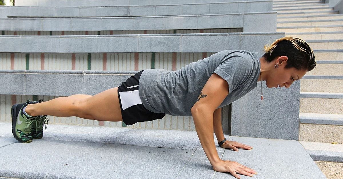 Push-ups in a workout (Image via Getty Images)