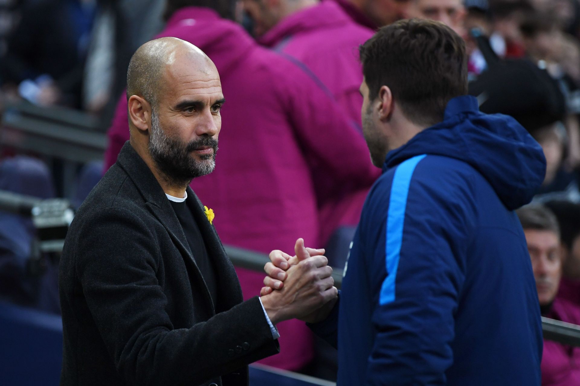 Mauricio Pochettino (right) heaps praise on Pep Guardiola.